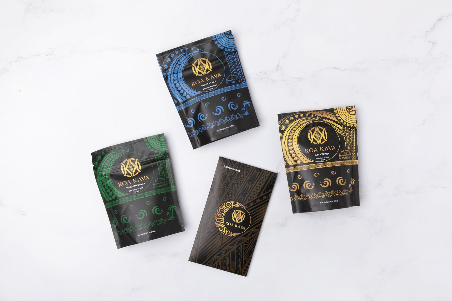 Three elegantly designed pouches of Koa Kava's Sample Pack - Premium Tongan, Vanuatu, and Fiji Kava displayed on a marble surface.